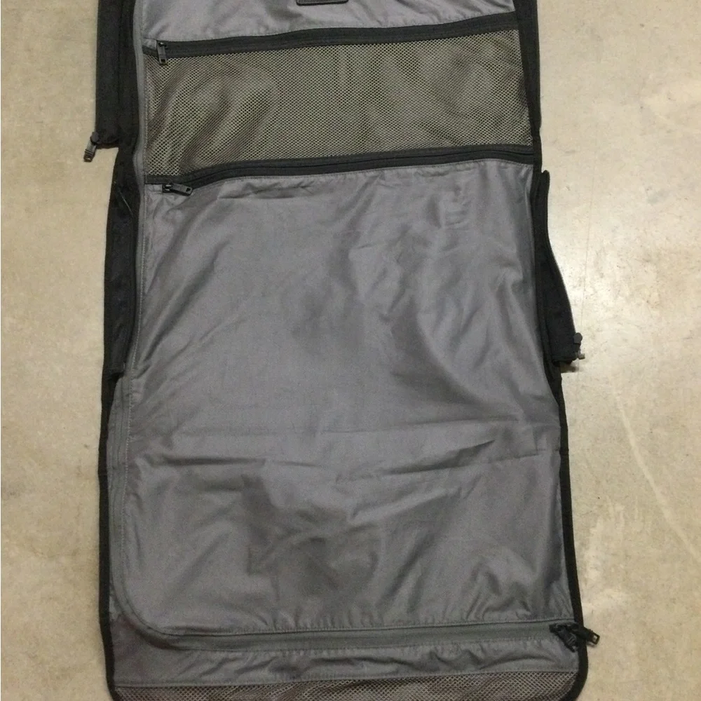 Tumi Black Men's Travel Duffel with Front Zip Pocket and Carry Handles